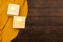 Golden Bitcoin With Big Wooden Block Above Scarf 