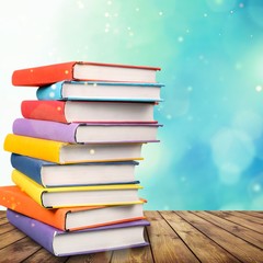 Wall Mural - stack books on wooden desk table