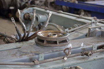 Disassembled passenger train chassis under repair at the depot workshop