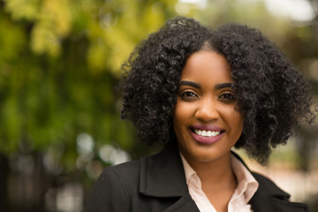 Wall Mural - Beautiful Confident African American Woman Smiling Outside