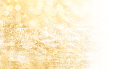 Wall Mural - golden christmas background banner with festive shiny sparkles and twinkling bokeh