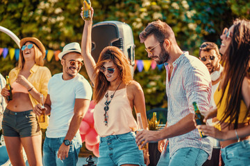 Poster - Beautiful young people having fun near swimming pool