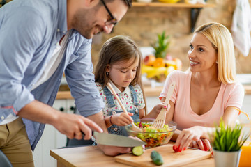 Poster - Family enjoying together in kitchen