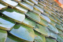 Green Roof Of Ancient Temple.Roof Tiles Texture Of Temple In Thailand.