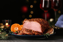 Plate With Homemade Christmas Ham On Dark Table