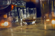 © maeching - Bartender Serve Whiskey, on wood bar,