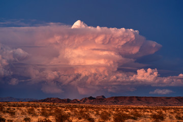 Wall Mural - supercell thunderstorm cumulonimbus cloud at sunset