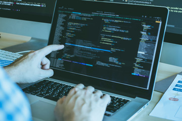 Wall Mural - developer programming hand pointing and coding technology website design safety of the social world 