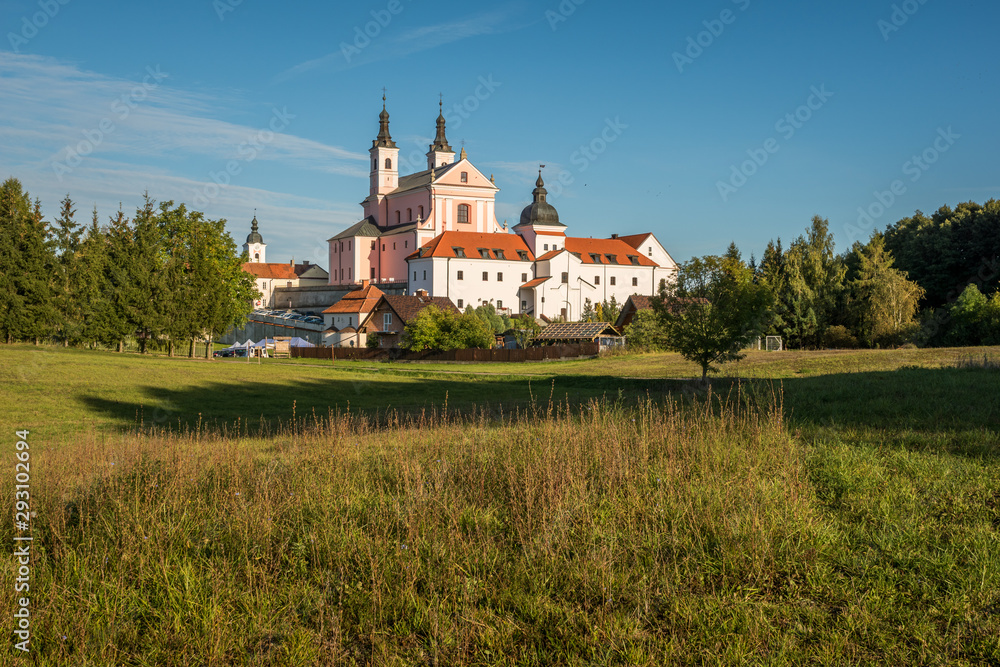 Church and monastery in Wigry on a sunny day, Podlaskie, Poland - obrazy, fototapety, plakaty 