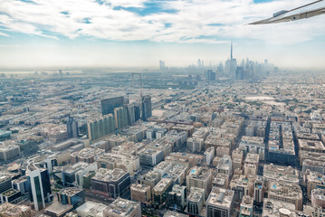 Wall Mural - Aerial view of Dubai skyline seen from plane, United Arab Emirates