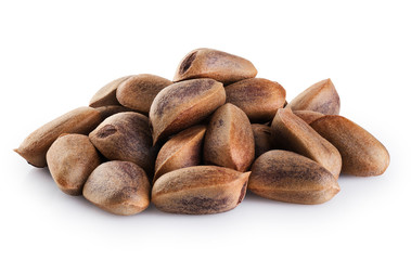 Wall Mural - Cedar pine nuts  isolated on white background.