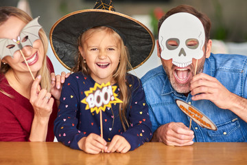 Wall Mural - Family having fun together during halloween