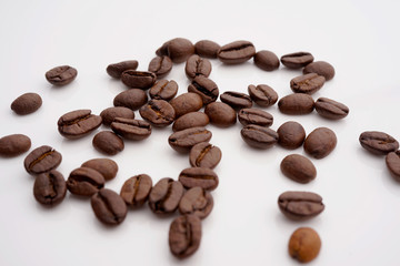 Wall Mural - Coffee beans. Distributed isolated on white background