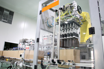 Wall Mural - Close up Beverage bottle sorting machine