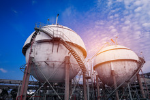 Gas Storage Sphere Tanks In Oil And Gas Refinery Industrial Plant On Blue Sky With White Cloud Background