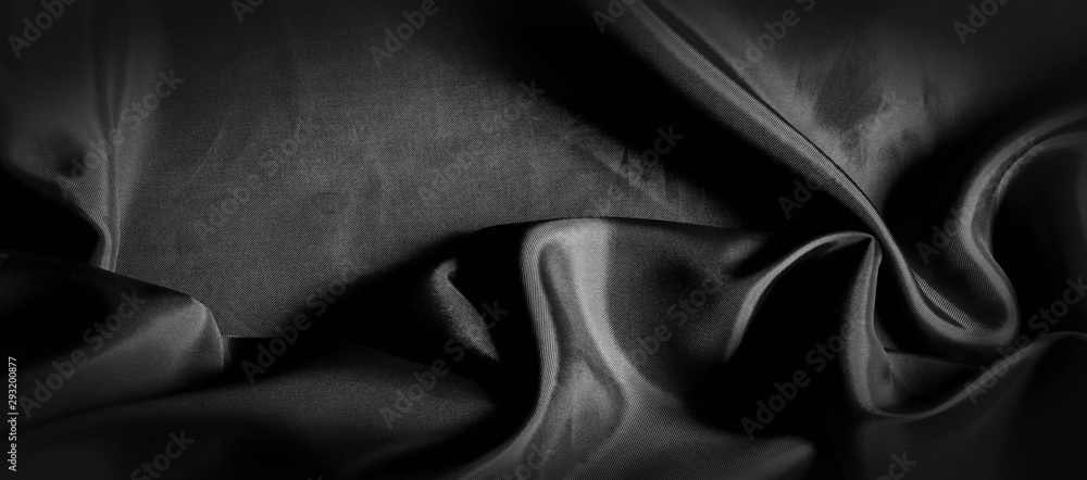 texture, background, pattern. Black silk fabric. It is black and heat resistant with gray. Transform its tougher drape into a design for any event. It is a crispy, lightly textured hand. - obrazy, fototapety, plakaty 