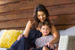 © digitalskillet1 - Portrait of a young Hispanic Mother and her son.
