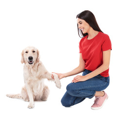 Canvas Print - Young woman and her Golden Retriever dog on white background