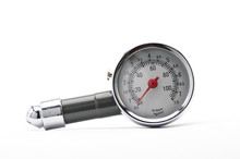 Pressure Gauge For Measuring Air Pressure In Car Tires On A White Background