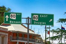 Overhead Green Route Gantry Sign For US 80 West To Benson And East To Douglas In Arizona