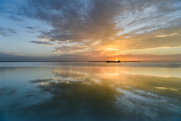 Wall Mural - beautiful sunset glow reflected in salt lake