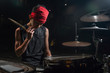 © TheVisualsYouNeed - Asian American mixed teenager playing drums at home garden . cool and handsome young boy practicing on drum kit rehearsing passionate in badass rock band look