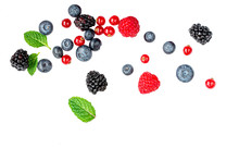 Falling Wild Berries Mix Isolated On White Background, Top View. Strawberry, Raspberry, Blueberry And Mint Leaf.