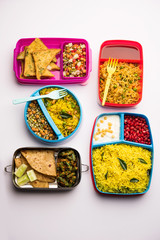 Wall Mural - group of Lunch Box / Tiffin for Indian kids, showing variety or multiple option or combination of healthy food for your school going children