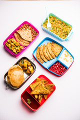 Wall Mural - group of Lunch Box / Tiffin for Indian kids, showing variety or multiple option or combination of healthy food for your school going children