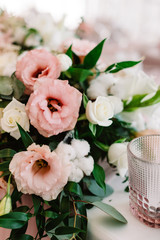 Poster - Art decoration of the dining table with small candles and fresh flowers