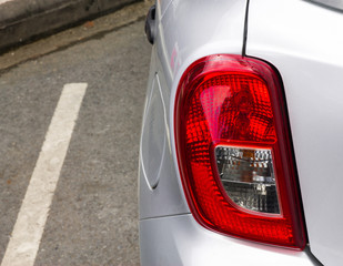 Car brake lights at the back of the car