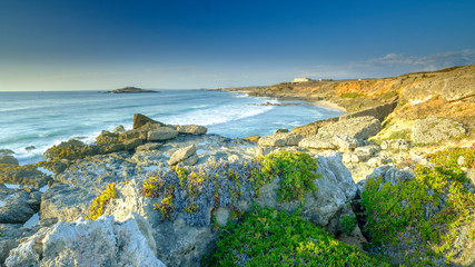 Sunset near Illha do Pessequiro (the 'Peachtree') along the Vincentine Coast National Park in the southwest of Alentejo region, Portugal