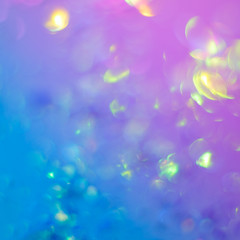 Wall Mural - Abstract background of glitter and foil hologram, Glittering dust particles. Backdrop for your design.