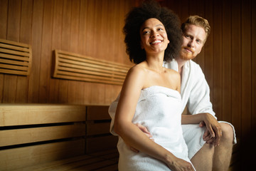 Poster - Happy couple having a steam bath in a sauna