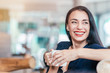© Adamov - Morning vibes. Business lady drinking coffee in the office. Copy space on the left side