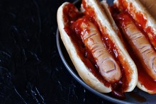 Hot Dog For Halloween. A Hot Dog Sausage In A Severed Finger In Abundance Ketchup As Blood. Food Ghoul. 