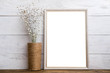 © Taras_Muroslavovuch - Mockup of blank brown frame poster on wall with linen
