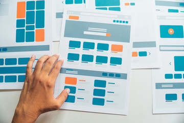 Website designer Creative planning application developer development draft sketch drawing template layout prototype framework wireframe design studio . User experience concept .