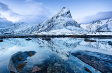 Mountains Ridge And Reflection On The Water Surface. Natural Landscape In The Norway. Mountains And Sea. Norway - Travel