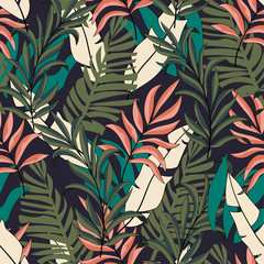  Trendy tropical seamless fashion pattern with bright pink and green leaves and flowers on dark background.  Summer colorful hawaiian seamless pattern with tropical plants. Tropical botanical.