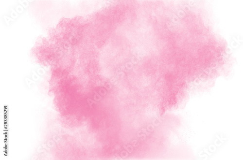 Abstract pink dust explosion. abstract pink powder splattered on white backgr...