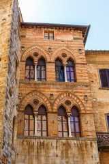 Sticker - Old house facade with mullioned windows in italy