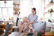 © zinkevych - Aged pensioner feeling thankful to her pleasant caregiver