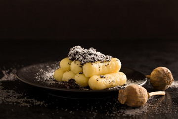 Potato dumplings with poppy seeds and sugar.