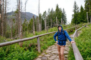 man hiker hiking on trail