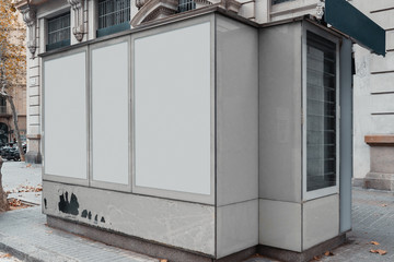Wall Mural - Blank canvas white outdoor banner at Newsstand with newspapers and magazines