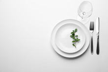 Elegant Table Setting On White Background, Top View