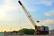 Large Crawler Crane Or Dragline Excavator With A Heavy Metal Wrecking Ball On A Steel Cable. Wrecking Balls At Construction Sites. Dismantling And Demolition Of Buildings And Structures - Image