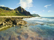 Scenic View Of Beach In Ka'ena Point State Park Against Sky