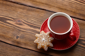 Cup of tea with Christmas gingerbread cookie